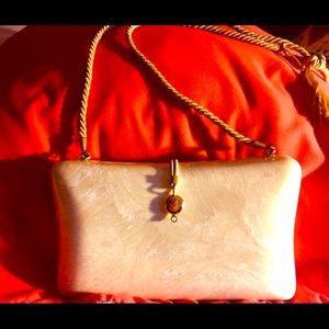 Dressy pearlized  shell clutch bag